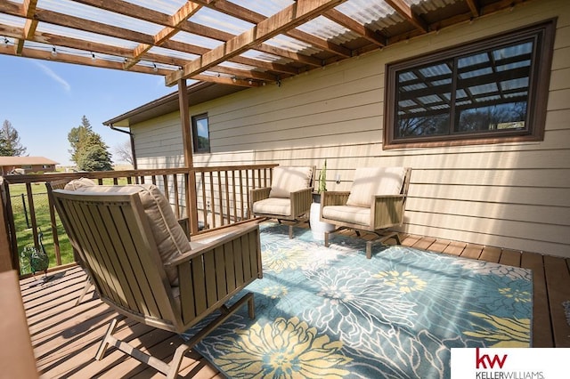 wooden deck with a pergola