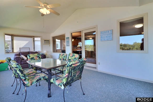 dining room with lofted ceiling, baseboards, carpet floors, a ceiling fan, and a wall mounted air conditioner