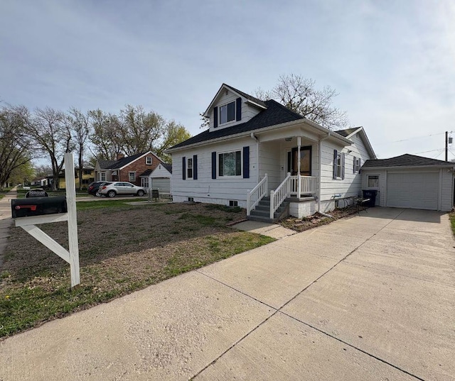 1626 N C St, Fremont, NE 68025 - bungalow with concrete driveway and an outbuilding