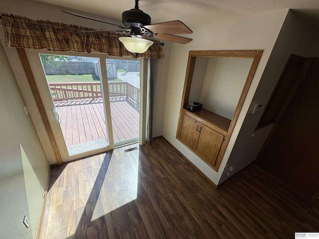 1626 N C St, Fremont, NE 68025 - unfurnished dining area featuring dark wood finished floors and ceiling fan