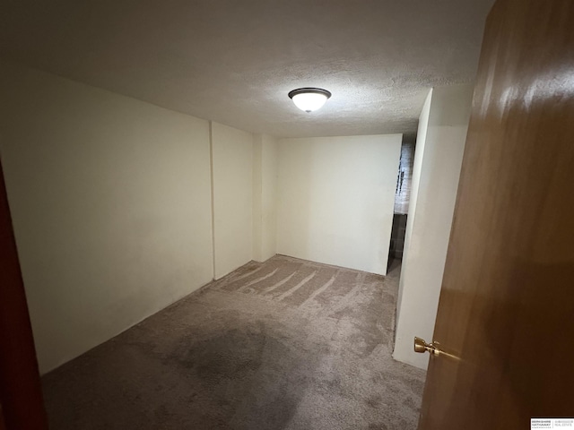 1626 N C St, Fremont, NE 68025 - carpeted spare room with a textured ceiling