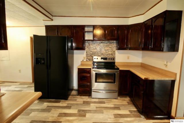 kitchen featuring stainless steel range with electric stovetop, light countertops, dark brown cabinets, light wood-style floors, and black refrigerator with ice dispenser