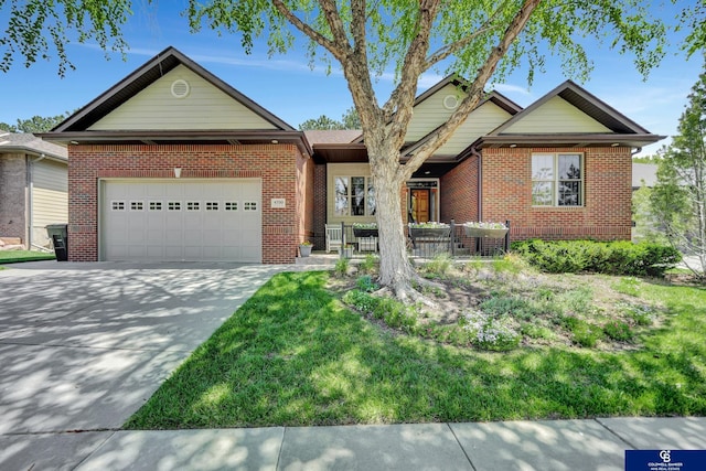 ranch-style home with brick siding, an attached garage, and driveway