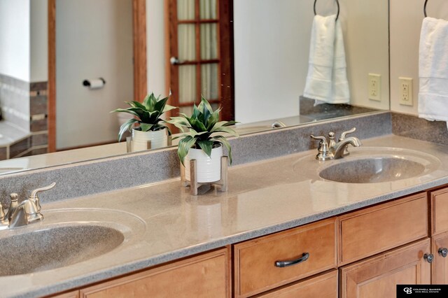 bathroom with double vanity