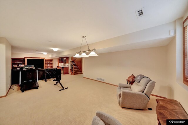 rec room with carpet floors and baseboards