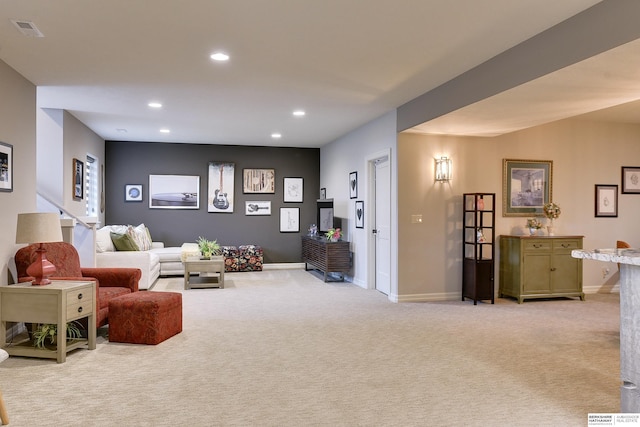 8914 N 171st St, Bennington, NE 68007 - living room featuring light colored carpet, recessed lighting, and baseboards