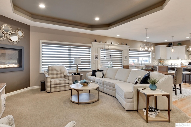 8914 N 171st St, Bennington, NE 68007 - living area with a chandelier, recessed lighting, and baseboards