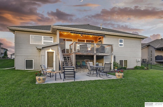 8914 N 171st St, Bennington, NE 68007 - back of property featuring a patio area, stairs, and brick siding