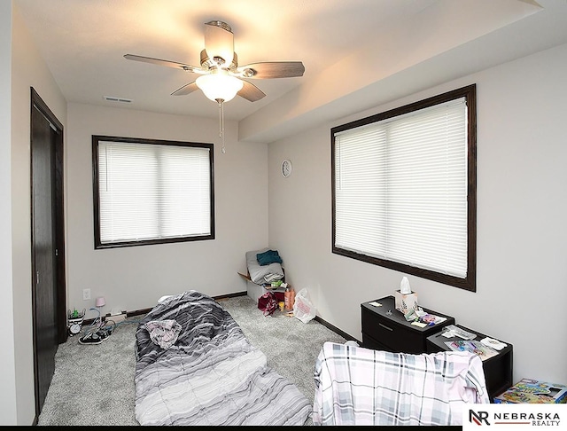bedroom with a ceiling fan, carpet, baseboards, and visible vents