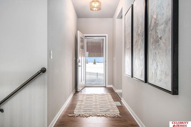 16925 Curtis Ave, Omaha, NE 68116 - doorway with baseboards and wood finished floors