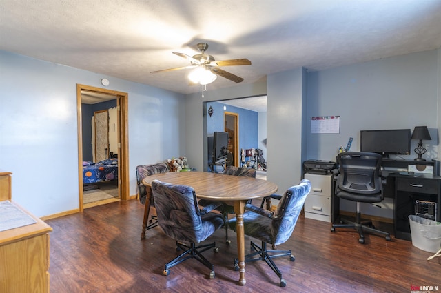 dining room with baseboards, wood finished floors, and ceiling fan
