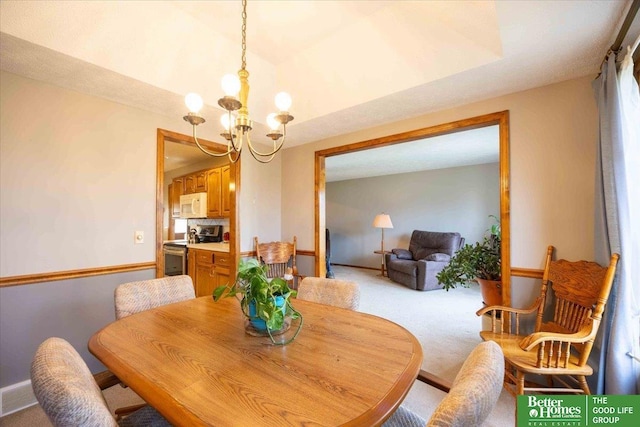 dining space featuring visible vents, light colored carpet, a notable chandelier, and baseboards