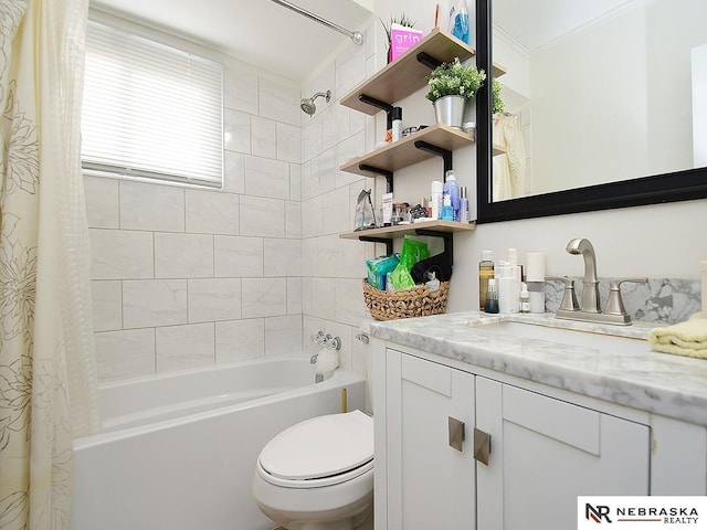 bathroom with toilet, vanity, ornamental molding, and shower / tub combo with curtain