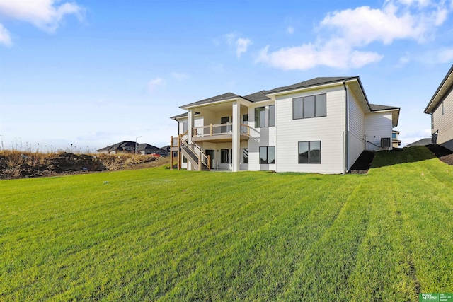 rear view of property with stairs, cooling unit, and a lawn