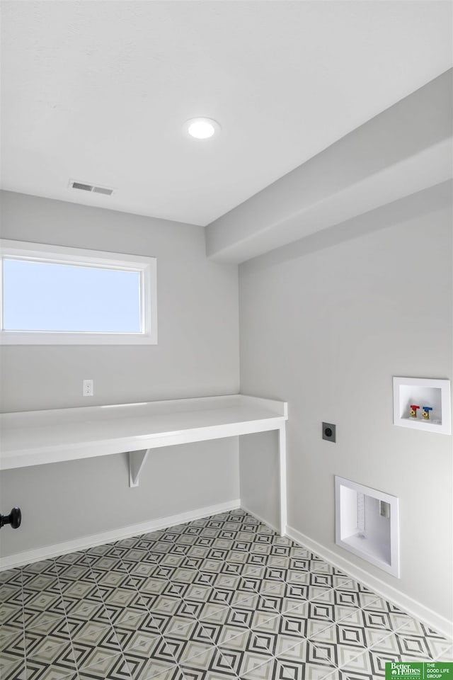laundry area with visible vents, baseboards, washer hookup, laundry area, and electric dryer hookup