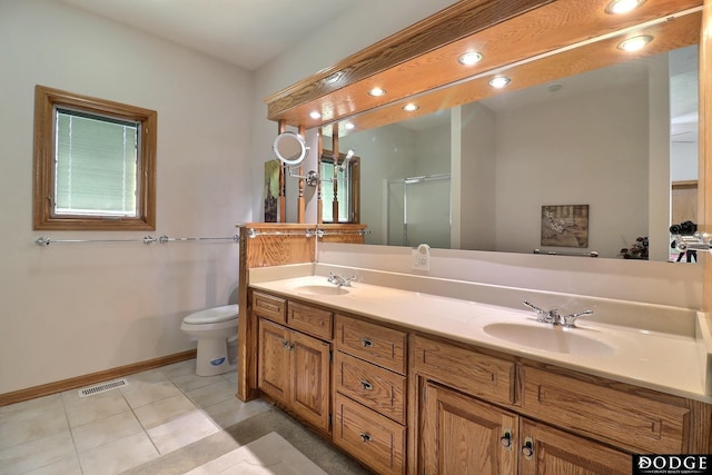 bathroom featuring double vanity, visible vents, a sink, and a stall shower