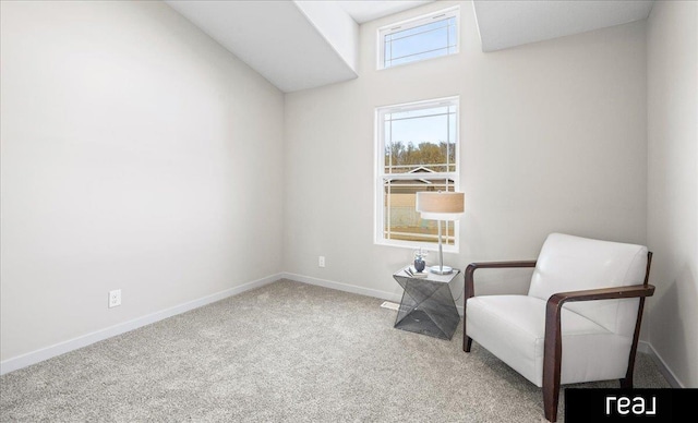 unfurnished room featuring baseboards and carpet floors