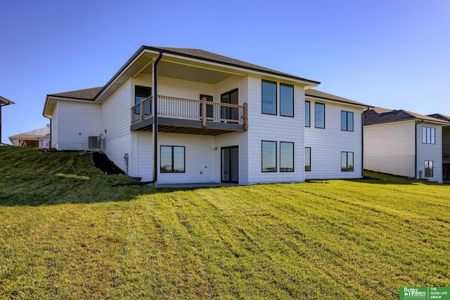 5721 N 195th St, Elkhorn, NE 68022 - rear view of property featuring a balcony, a lawn, and roof with shingles