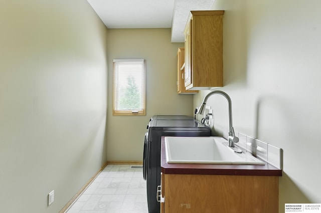 6520 N 157th St, Omaha, NE 68116 - laundry room featuring cabinet space and washing machine and dryer