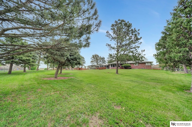 view of yard featuring fence