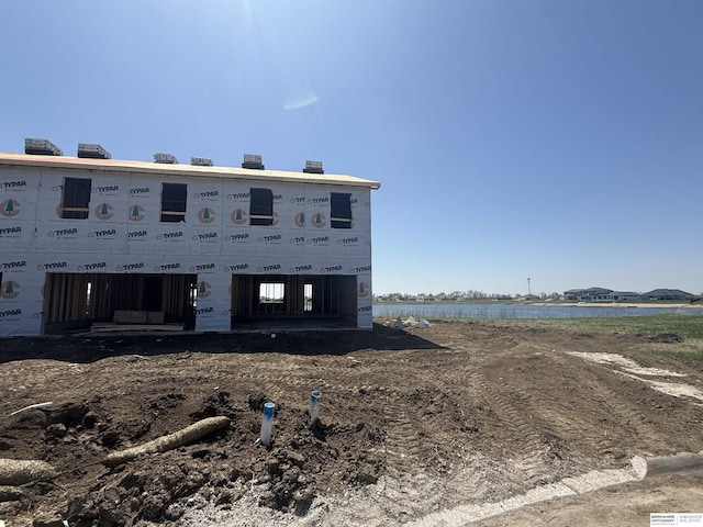 4693 E 21st Ave, Fremont, NE 68025 - rear view of house featuring a water view