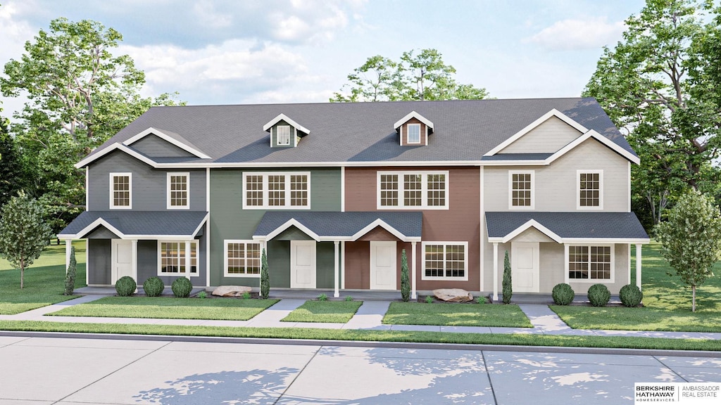 4703 E 21st Ave, Fremont, NE 68025 - townhome / multi-family property featuring a front yard