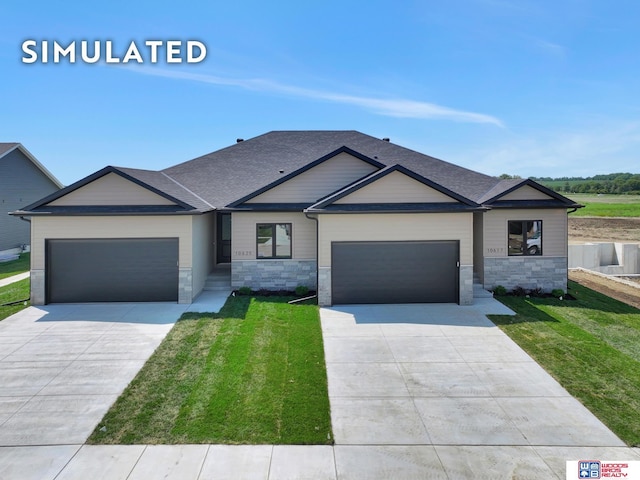 10551 Majestic Ln, Lincoln, NE 68527 - view of front of home with a garage, a front yard, stone siding, and concrete driveway