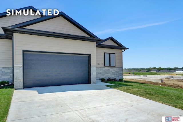 10551 Majestic Ln, Lincoln, NE 68527 - view of front of property featuring stone siding, a garage, and concrete driveway