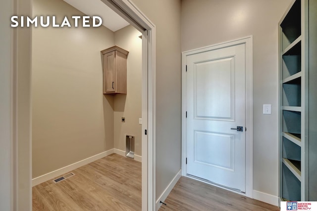 10551 Majestic Ln, Lincoln, NE 68527 - interior space featuring visible vents, light wood-style flooring, and baseboards