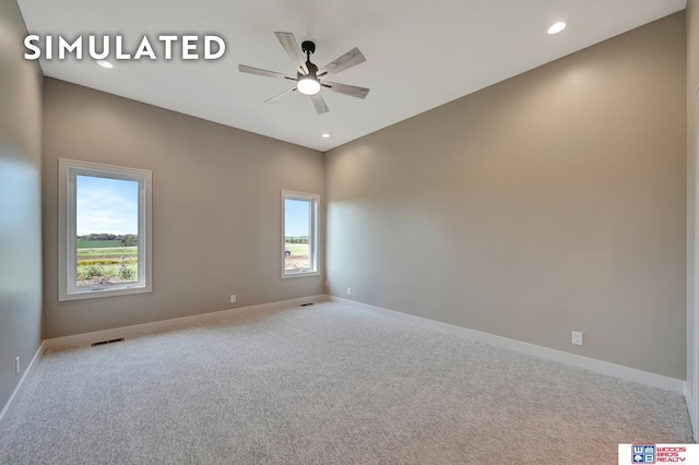 10551 Majestic Ln, Lincoln, NE 68527 - unfurnished room with visible vents, baseboards, ceiling fan, recessed lighting, and carpet flooring