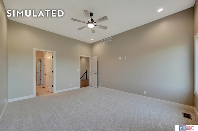 10551 Majestic Ln, Lincoln, NE 68527 - unfurnished bedroom featuring visible vents, baseboards, recessed lighting, and light carpet