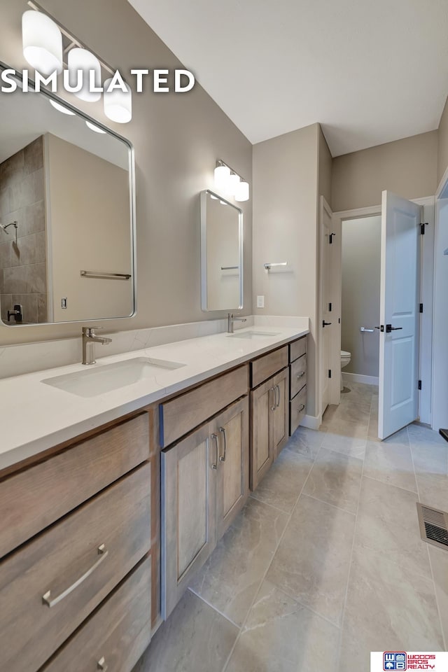 10551 Majestic Ln, Lincoln, NE 68527 - full bath featuring a sink, toilet, and double vanity