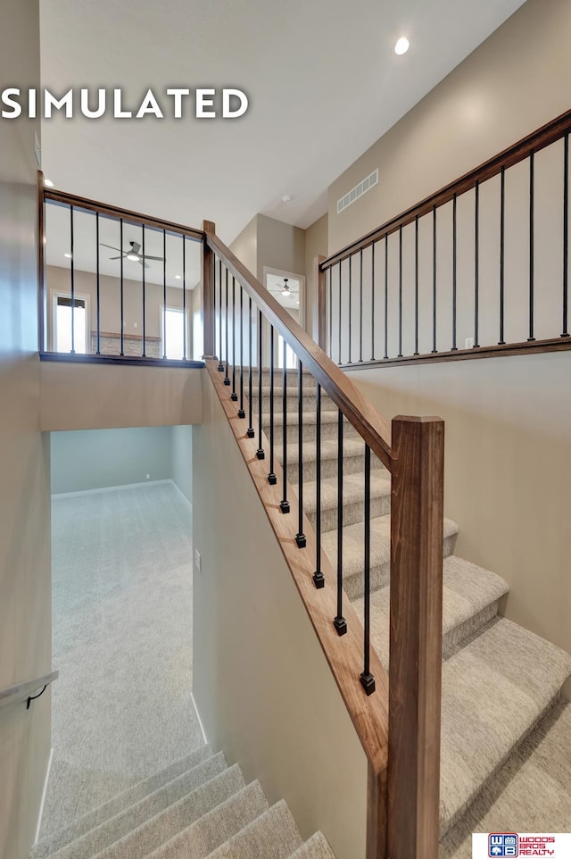 10551 Majestic Ln, Lincoln, NE 68527 - stairway with visible vents, recessed lighting, and carpet
