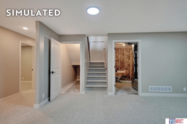 10551 Majestic Ln, Lincoln, NE 68527 - stairs featuring carpet flooring, visible vents, and baseboards