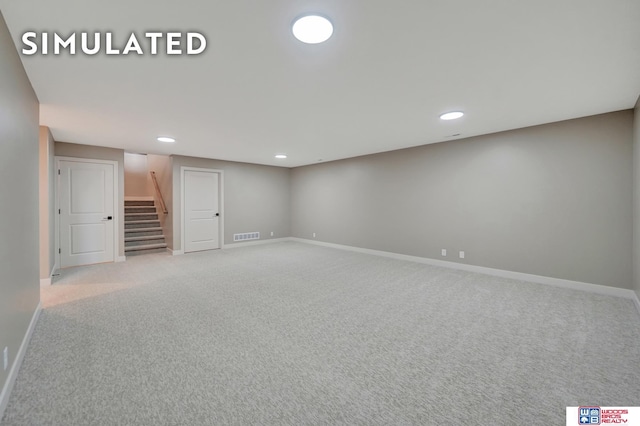 10551 Majestic Ln, Lincoln, NE 68527 - interior space featuring stairway, baseboards, and carpet
