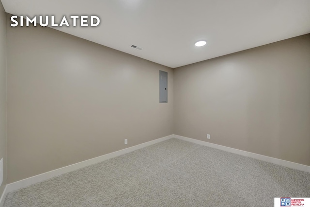 10551 Majestic Ln, Lincoln, NE 68527 - spare room with visible vents, baseboards, carpet, and electric panel