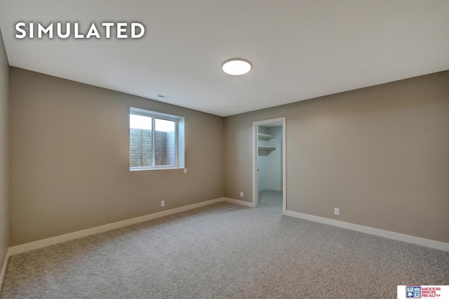 10551 Majestic Ln, Lincoln, NE 68527 - empty room featuring baseboards, visible vents, and carpet floors