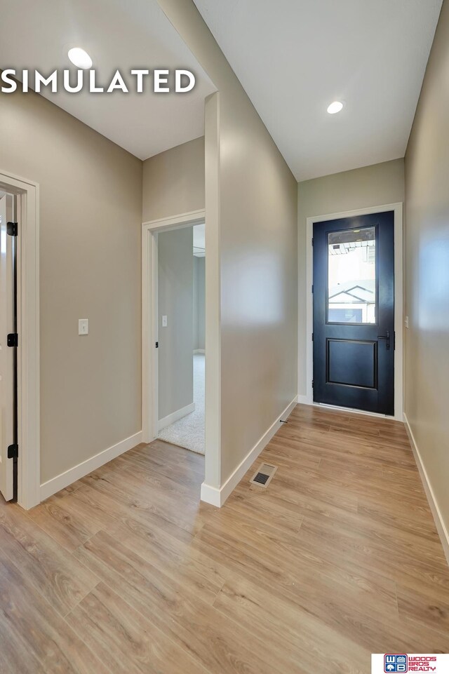 10551 Majestic Ln, Lincoln, NE 68527 - entryway with light wood-style floors, recessed lighting, visible vents, and baseboards