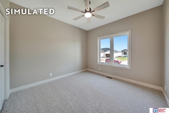 10551 Majestic Ln, Lincoln, NE 68527 - empty room featuring light carpet, visible vents, baseboards, and ceiling fan