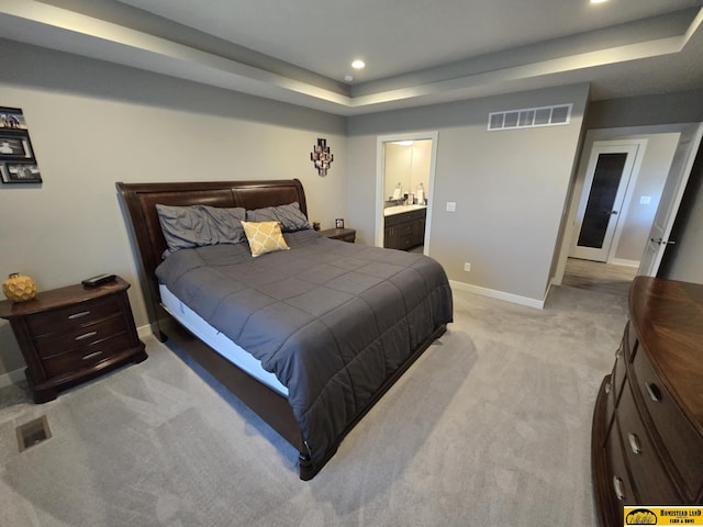 bedroom featuring visible vents, baseboards, recessed lighting, and light carpet