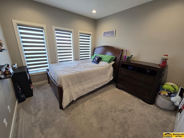 bedroom with baseboards, multiple windows, carpet, and recessed lighting
