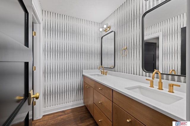 676 Waterford Pointe Pointe, Ashland, NE 68003 - full bath with wallpapered walls, wood finished floors, double vanity, and baseboards