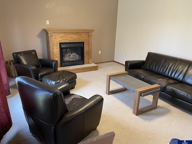carpeted living room featuring a fireplace