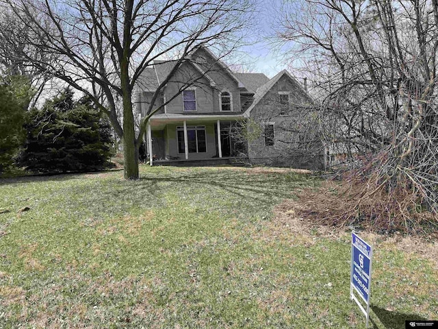 traditional home with a front yard