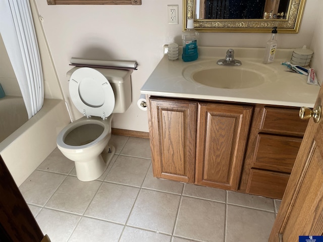 bathroom with toilet, vanity, tile patterned floors, and shower / bath combo with shower curtain