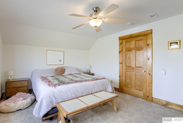 carpeted bedroom with baseboards, visible vents, ceiling fan, and lofted ceiling