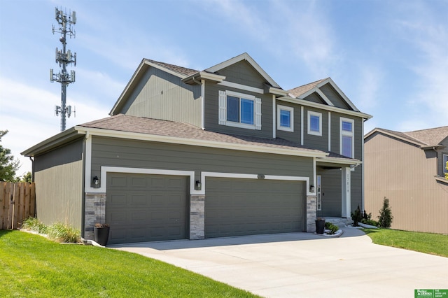 craftsman-style home featuring driveway, an attached garage, stone siding, and a shingled roof