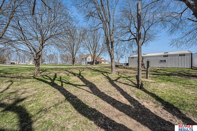 2860 335th St, Logan, IA 51546 - view of yard with an outbuilding and a pole building