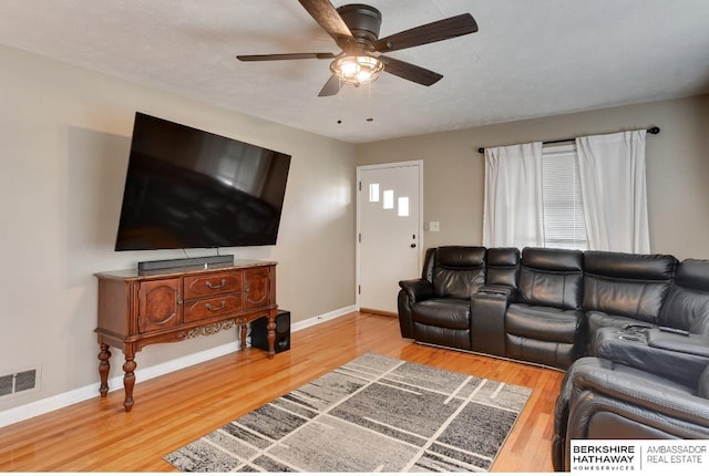 161 S Linden St, Wahoo, NE 68066 - living area with ceiling fan, baseboards, and wood finished floors