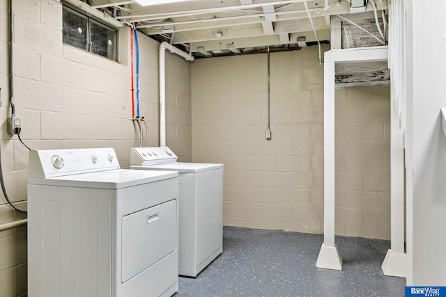 laundry area with separate washer and dryer and laundry area